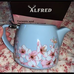 Stainless steel and ceramic tea pot